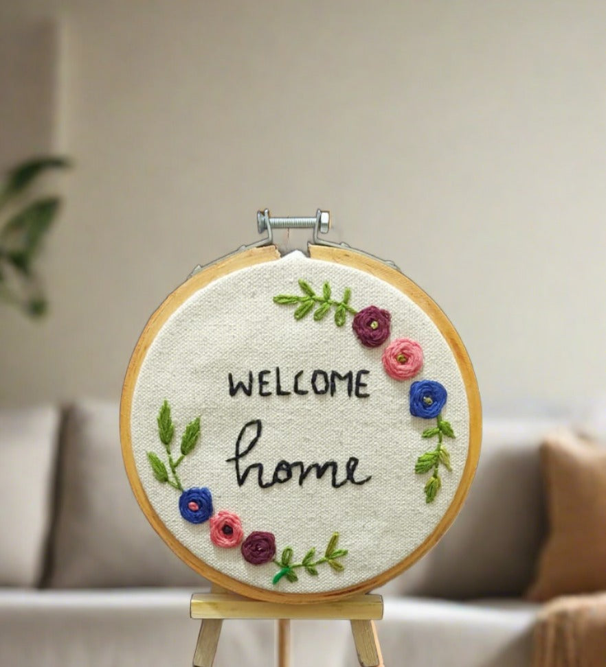 Welcoming Hand Embroidered hoop.