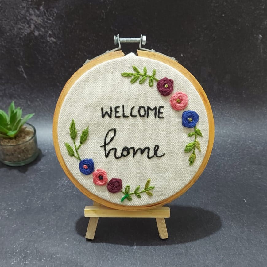 Welcoming Hand Embroidered hoop.